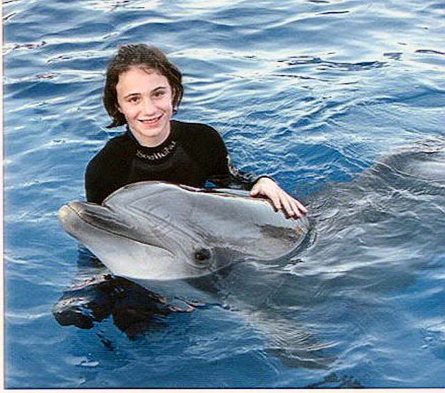 tova_with_dolphin